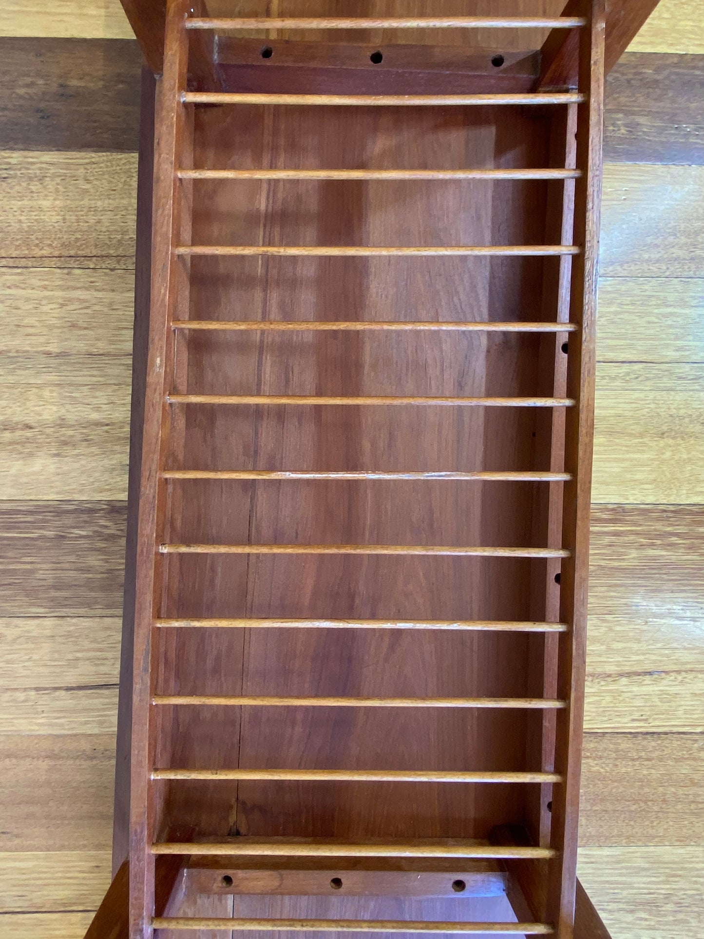 Vintage teak coffee table with magazine rack and carved details