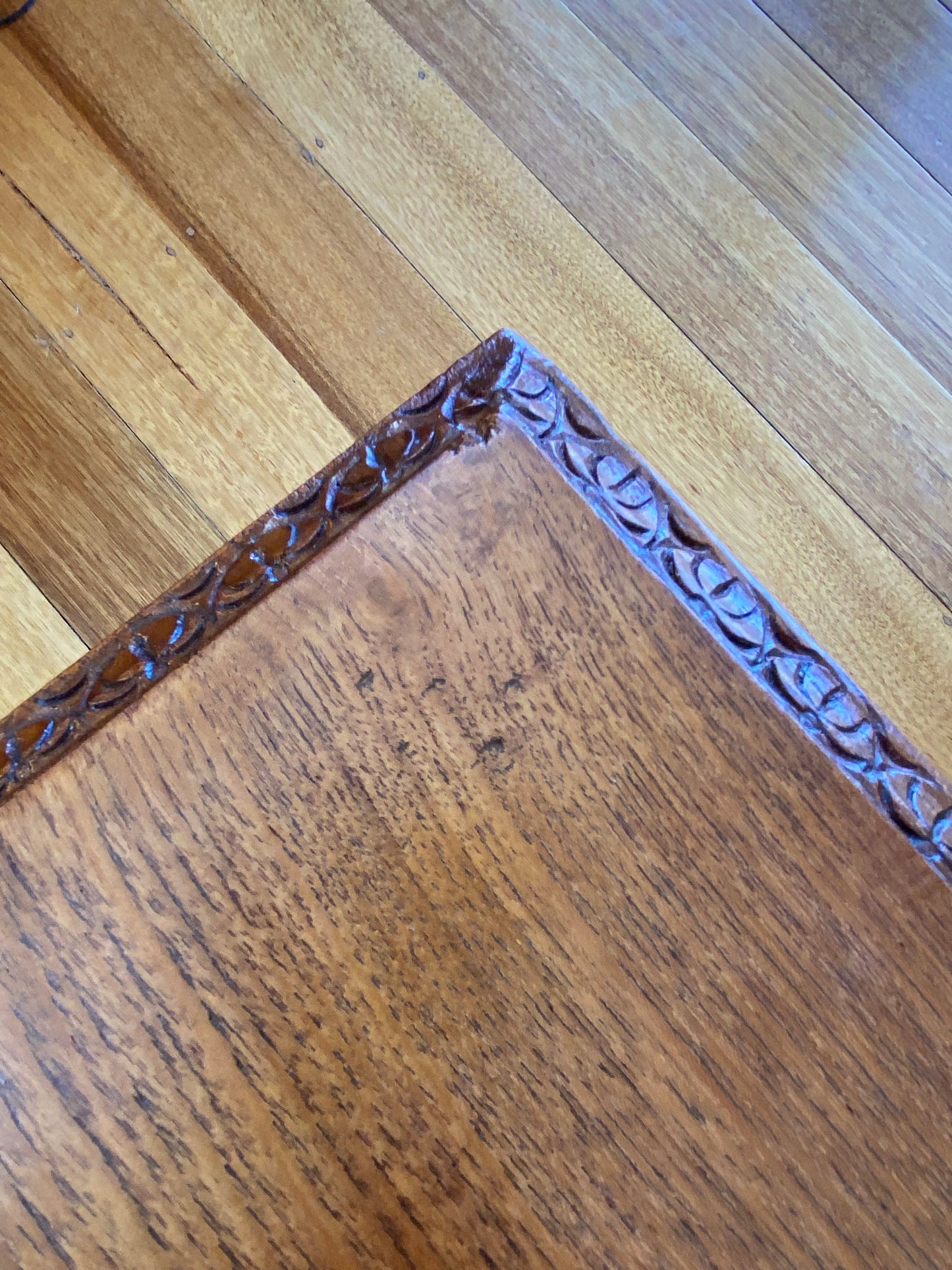 Vintage teak coffee table with magazine rack and carved details