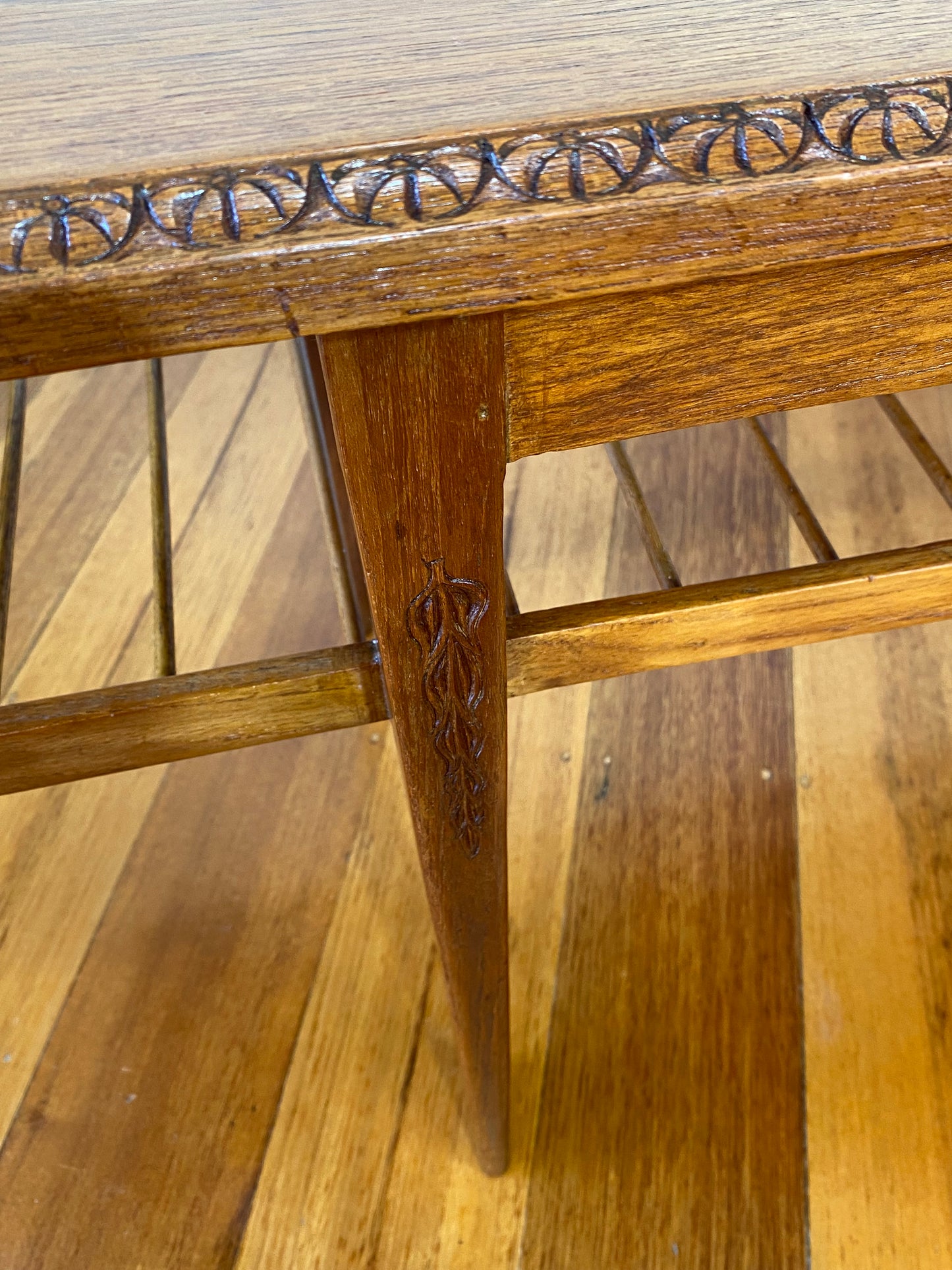 Vintage teak coffee table with magazine rack and carved details